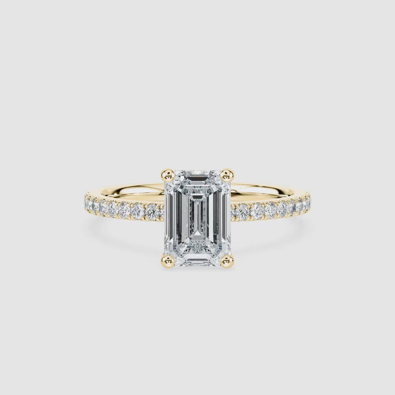Margot Hidden Halo Verlobungsring – Smaragdschliff – Gelbgold – Video