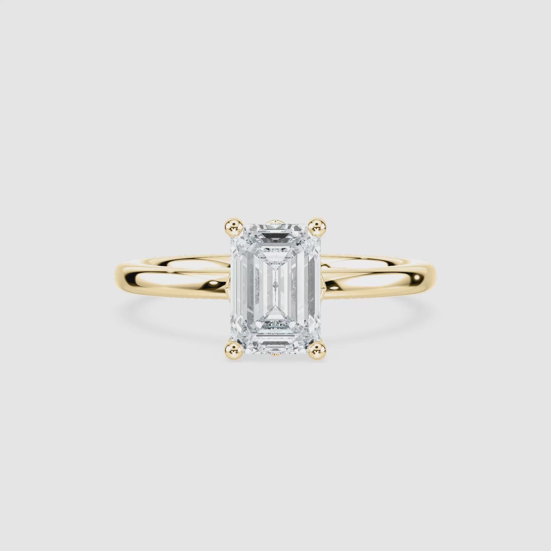 Video laden: Rosey Blüten-Solitaire Verlobungsring – Smaragdschliff – Gelbgold – Video
