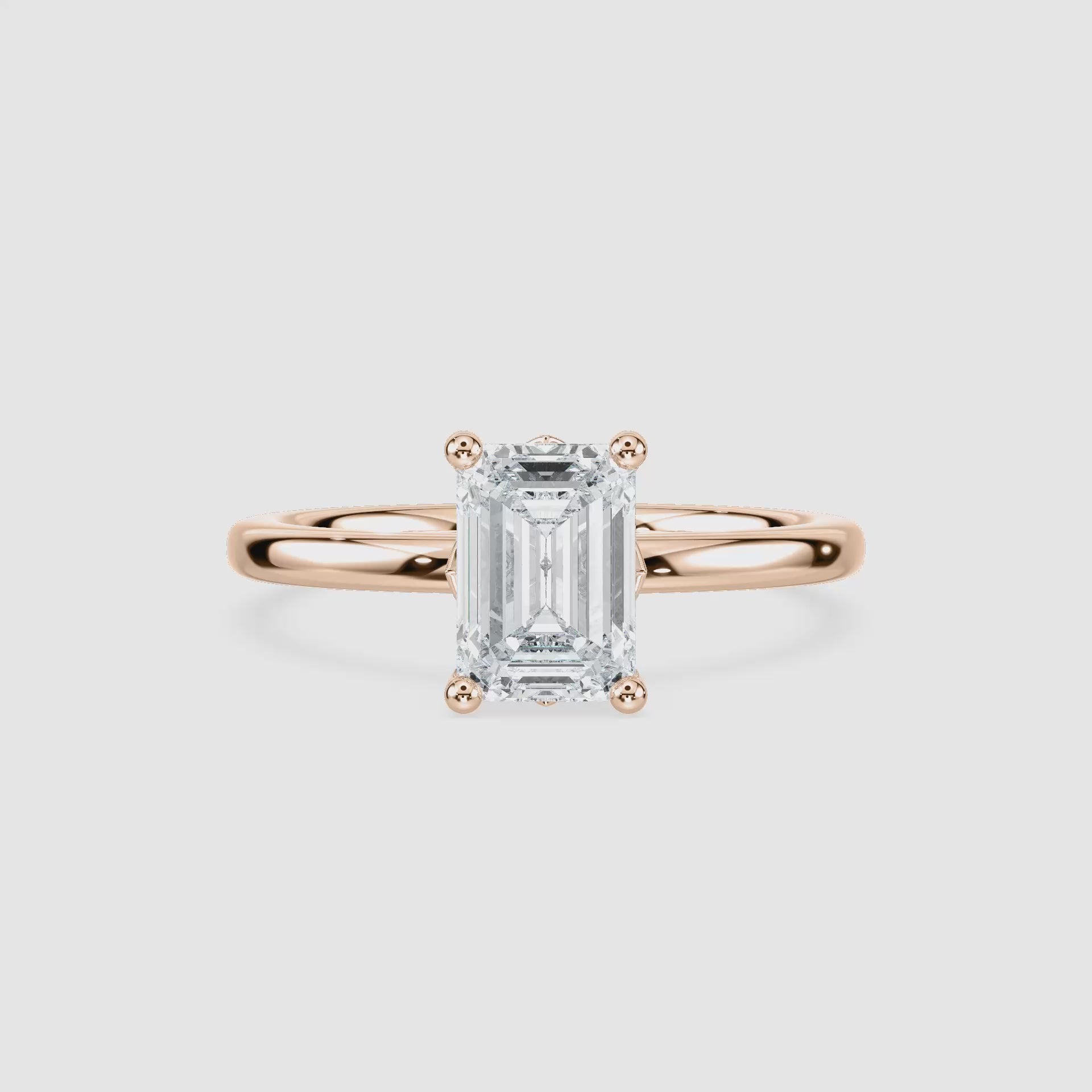 Video laden: Rosey Blüten-Solitaire Verlobungsring – Smaragdschliff – Roségold – Video