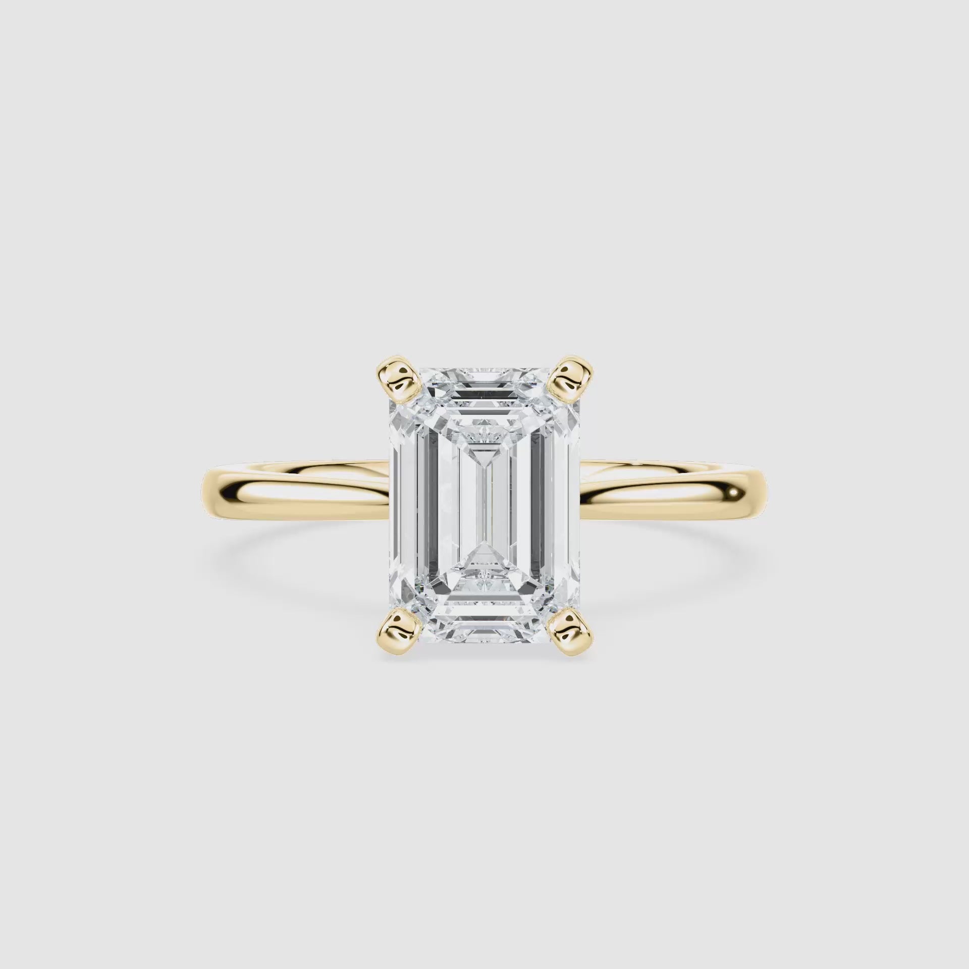 Video laden: Marie Kathedrale-Solitaire Verlobungsring – Smaragdschliff – Gelbgold – Video